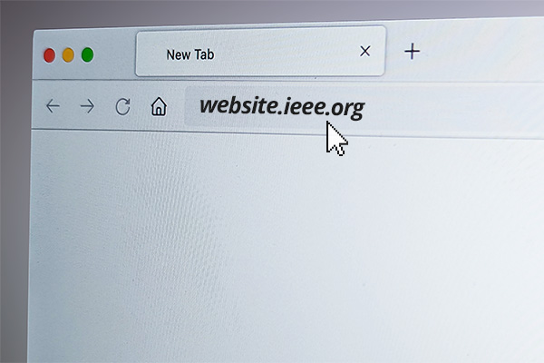 A screenshot of an internet browser with a mouse cursor clicking on the URL address bar to type a new URL.